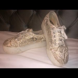 Superga women’s gold lace platforms